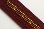 dark cranberry wine zipper tape with corn bronze teeth