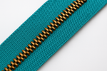Turquoise zipper tape with bronze teeth