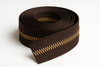 very dark chocolate brown zipper tape role with corn bronze teeth